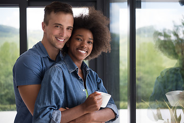 Image showing romantic happy young couple relax at modern home indoors