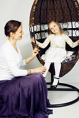 Image showing young mother with daughter at luxury home interior vintage