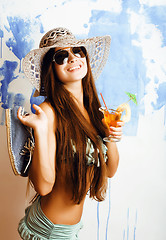 Image showing cute bright woman in sunglasses and hat with cocktail in bikini 