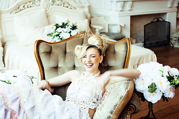 Image showing beauty emotional blond bride in luxury interior