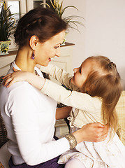 Image showing young mother with daughter at luxury home interior vintage