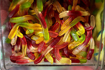 Image showing close up of gummy worms in box at candy shop