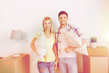 Image showing happy couple with stuff moving to new home