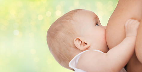 Image showing close up of breastfeeding baby