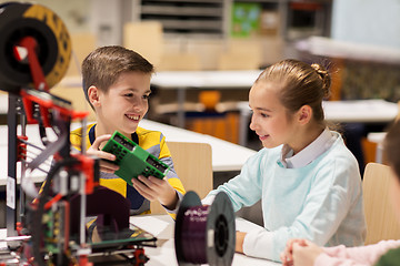 Image showing happy children with 3d printer at robotics school