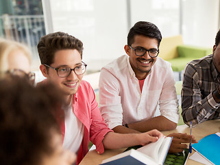 Image showing group of high school students sitting at table