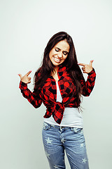 Image showing young happy smiling latin american teenage girl emotional posing on white background, lifestyle people concept 