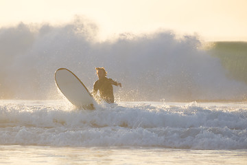 Image showing Body surfer riding a perfect wave.