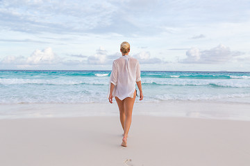 Image showing Woman on summer vacations at tropical beach of Mahe Island, Seychelles.