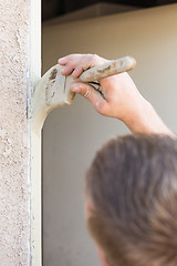 Image showing Professional Painter Cutting In With Brush to Paint House Door F