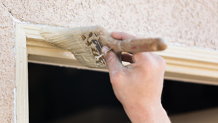 Image showing Professional Painter Cutting In With Brush to Paint House Door F