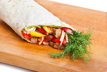 Image showing beef burrito with peppers, onion and tomato