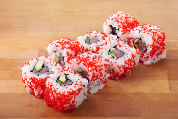 Image showing california sushi rolls on wooden plate