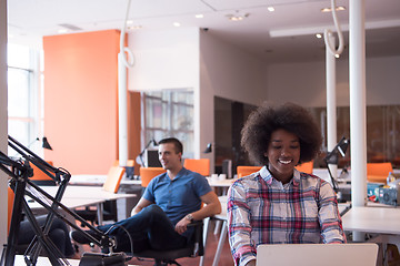 Image showing African American informal business woman working in the office