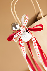 Image showing Gift bag with Merry Christmas ribbon