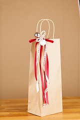 Image showing Gift bag with Merry Christmas ribbon