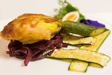 Image showing Delicious biscuit with beets, zucchini and pansy