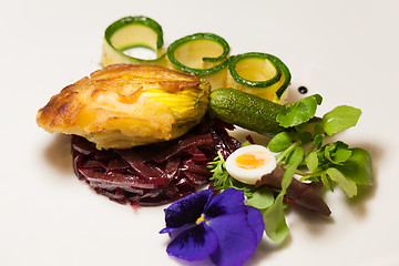 Image showing Delicious biscuit with beets, zucchini and pansy