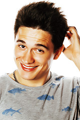 Image showing young handsome brunete man emotional posing on white background 