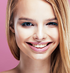 Image showing young pretty blonde woman with hairstyle close up and makeup on 