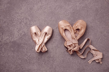 Image showing Ballet pointe shoes on pink background.