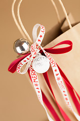 Image showing Gift bag with Merry Christmas ribbon