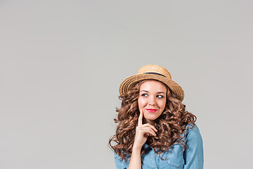 Image showing The girl in straw hat