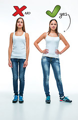 Image showing conceptual portrait of two beautiful twin young women