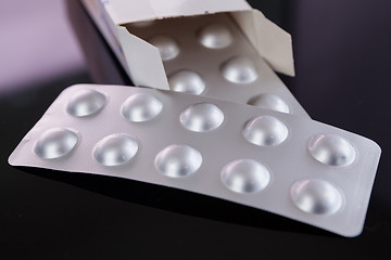 Image showing Silver blister pack of small pills