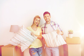 Image showing happy couple with stuff moving to new home