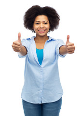 Image showing happy african american woman showing thumbs up