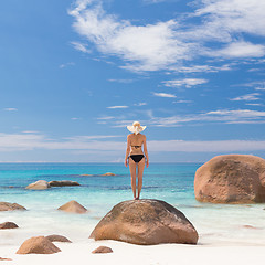 Image showing Woman enjoying Anse Lazio picture perfect beach on Praslin Island, Seychelles.