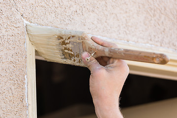 Image showing Professional Painter Cutting In With Brush to Paint House Door F