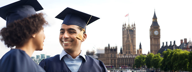 Image showing happy students or bachelors over london