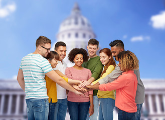 Image showing international group of happy people holding hands