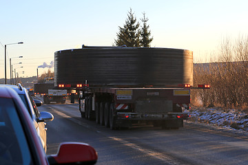 Image showing Convoy of Wide Load Transports at Sunset