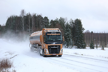 Image showing Volvo FH Semi Tank Truck on Snowy Highway 