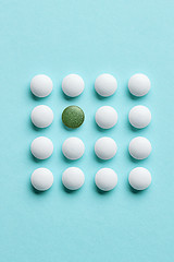 Image showing white and green pills