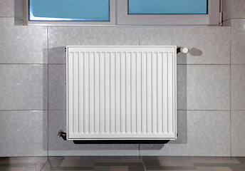 Image showing heating radiator under window