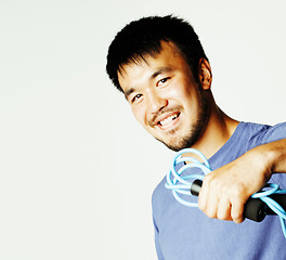 Image showing young pretty asian man in blue tshirt on white background isolat