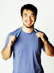 Image showing young pretty asian man in blue tshirt on white background isolat