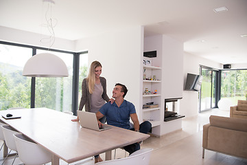 Image showing couple using laptop at home