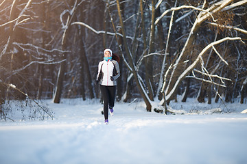 Image showing Young woman on morning jog