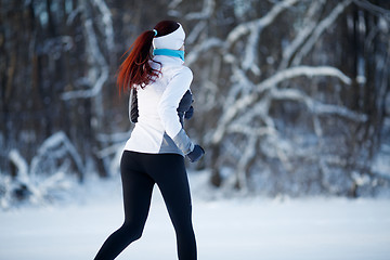 Image showing Brunette goes in for sports