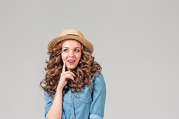 Image showing The girl in straw hat