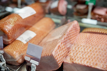 Image showing ham at grocery store stall