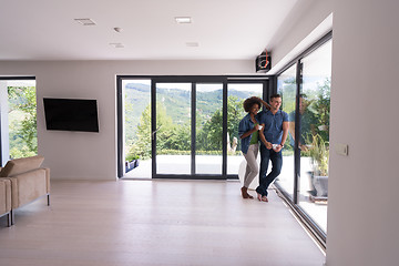 Image showing romantic happy young couple relax at modern home indoors