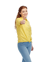 Image showing happy woman showing thumbs up