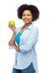 Image showing happy african american woman with green apple