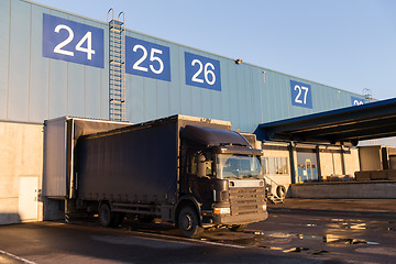 Image showing warehouse gates and truck loading